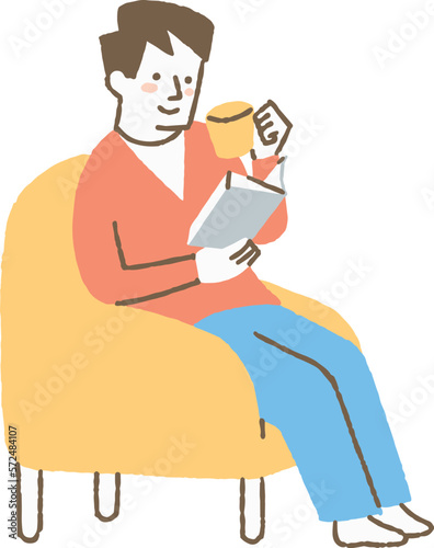 ソファーに座って読書する男性_色