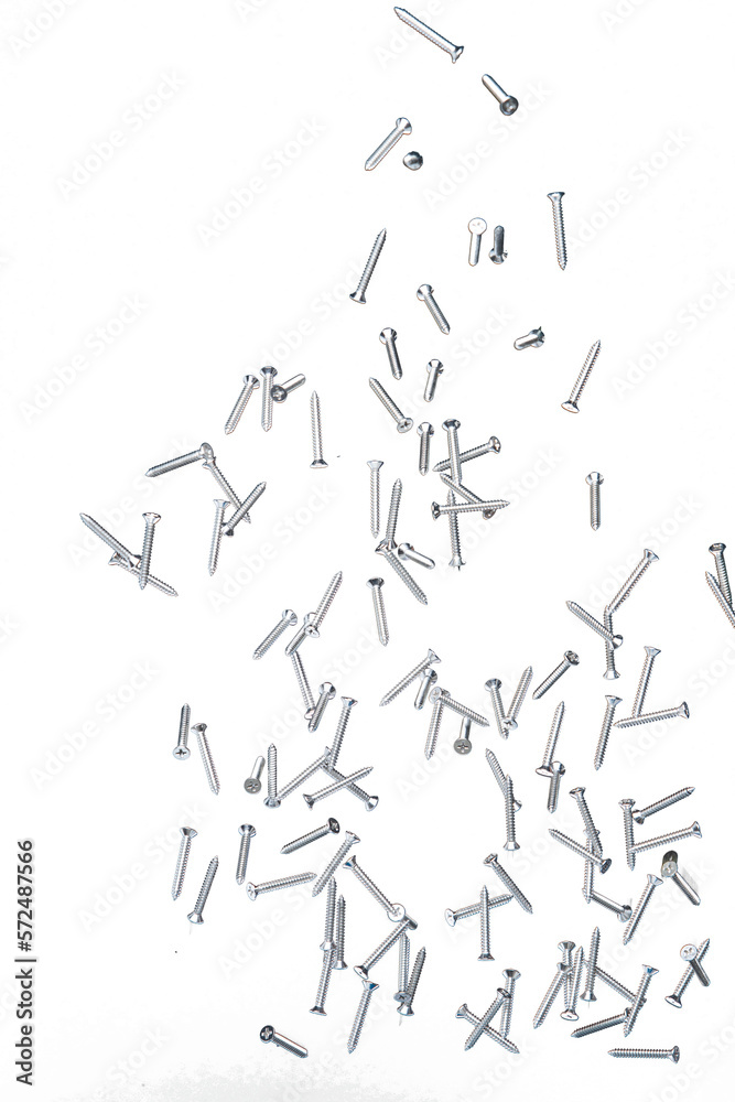 Screwdriver Nail fly floating in mid air. Many group screw nails short long metal fall as construction tools. Black background isolated. New Screwdriver Nail fall down unbox steel hardware work Screwdriver Nail fly floating in mid air. Many group screw nails short long metal fall as construction tools. Black background isolated. New Screwdriver Nail fall down unbox steel hardware work