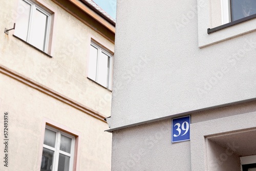 Plate with house number thirty nine on beautiful building outdoors
