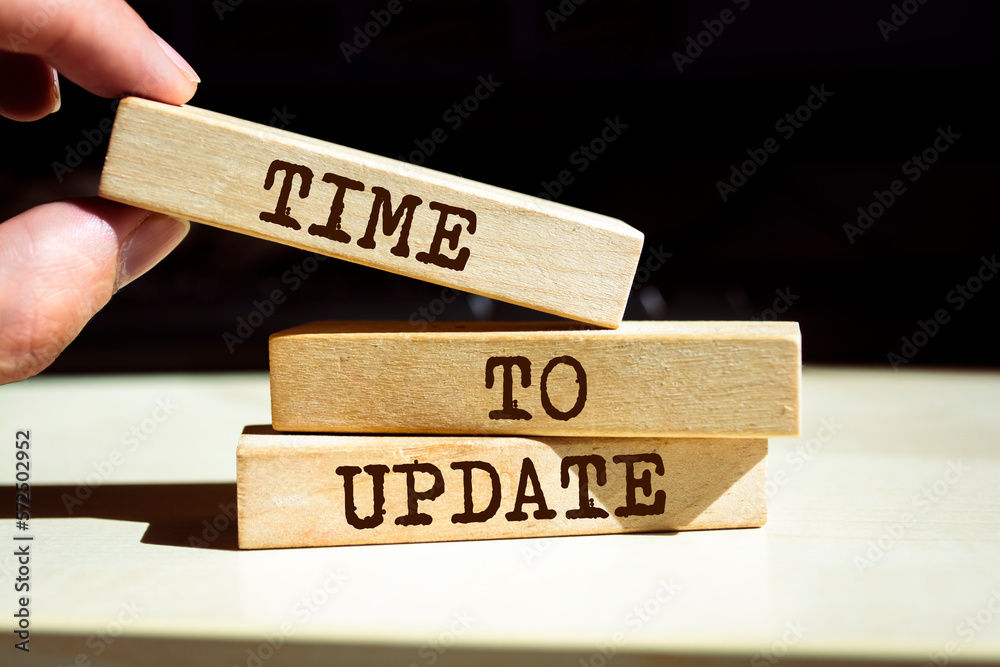 Wooden blocks with words 'Time To Update'. Wooden blocks with words 'Time To Update'.