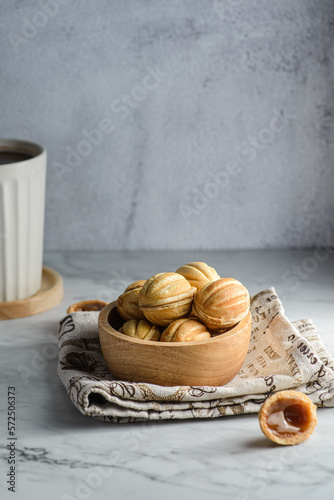 cookies in the form of nuts with caramel photo