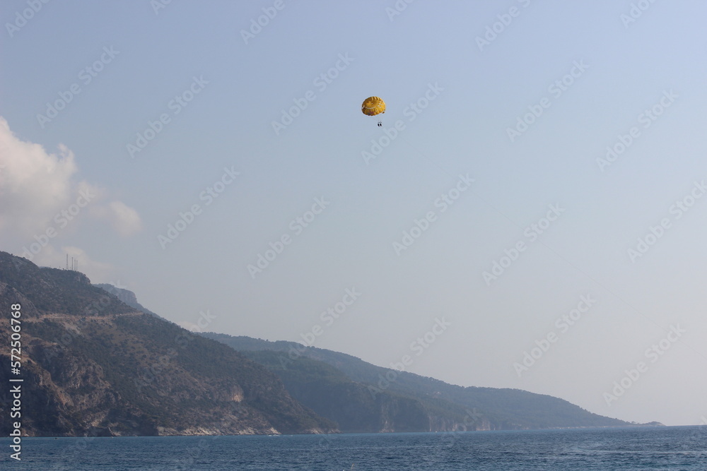 paragliding in the blue sky, paragliders, hang gliders at sky paragliding in the blue sky, paragliders, hang gliders at sky
