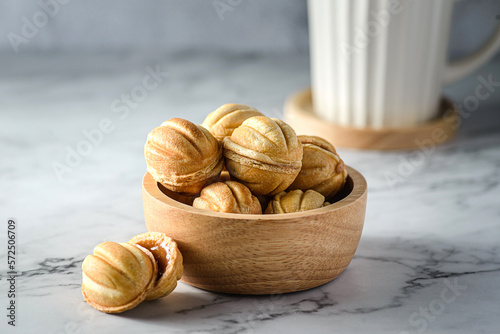 cookies in the form of nuts with caramel photo