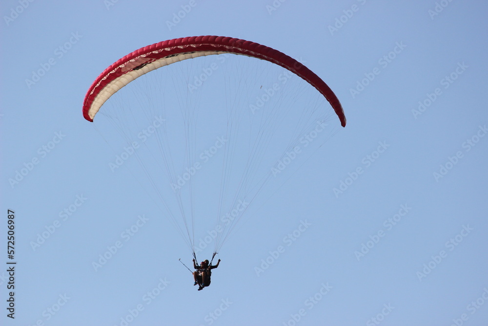 paraglider in the sky, zoom focus close shot paraglider in the sky, zoom focus close shot