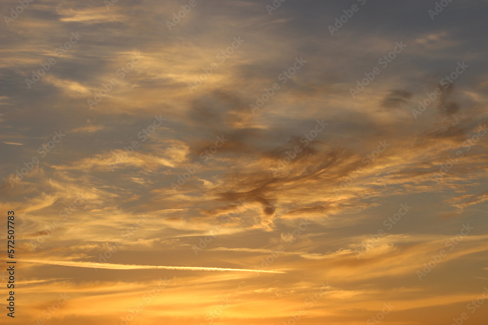 sunset sky with clouds, golden hour abstract clouds, orange and blue horizon 