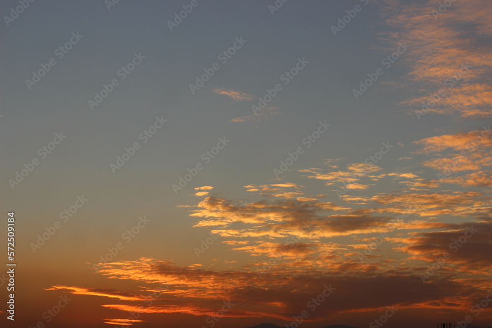 red sunset sky in the clouds, golden hour abstract clouds