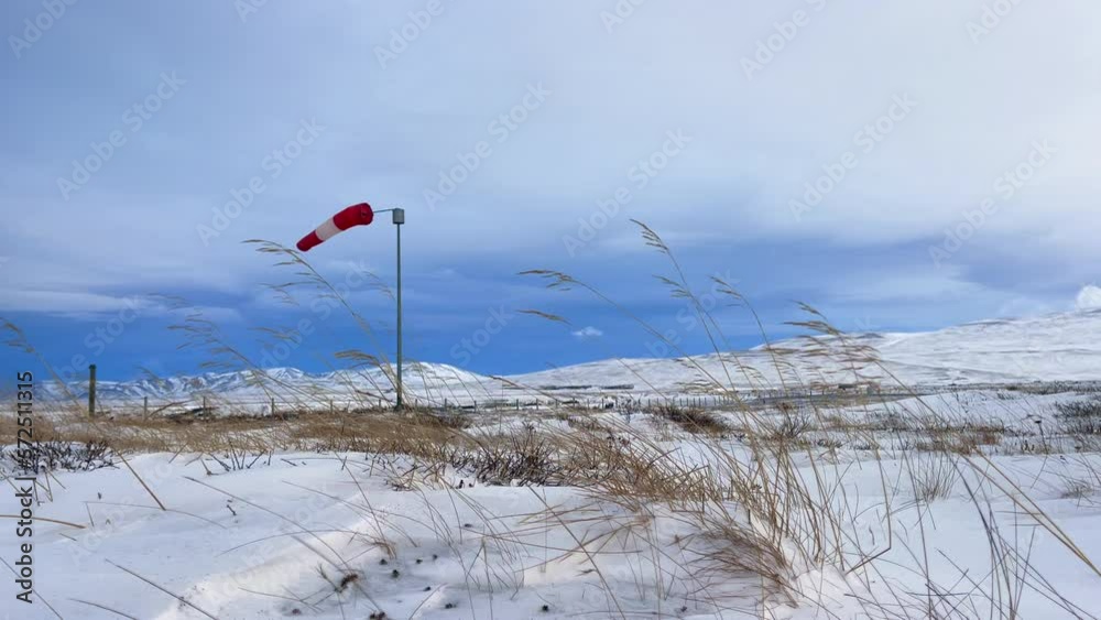 Windsock blowing in the arctic winter wind at Blönduos airfield in