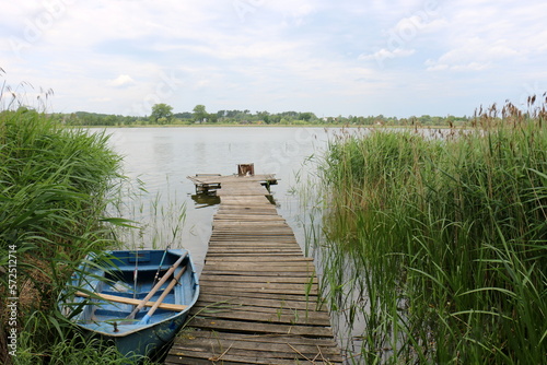 Rowing boat on the shore of Lake Naroch. © shimon