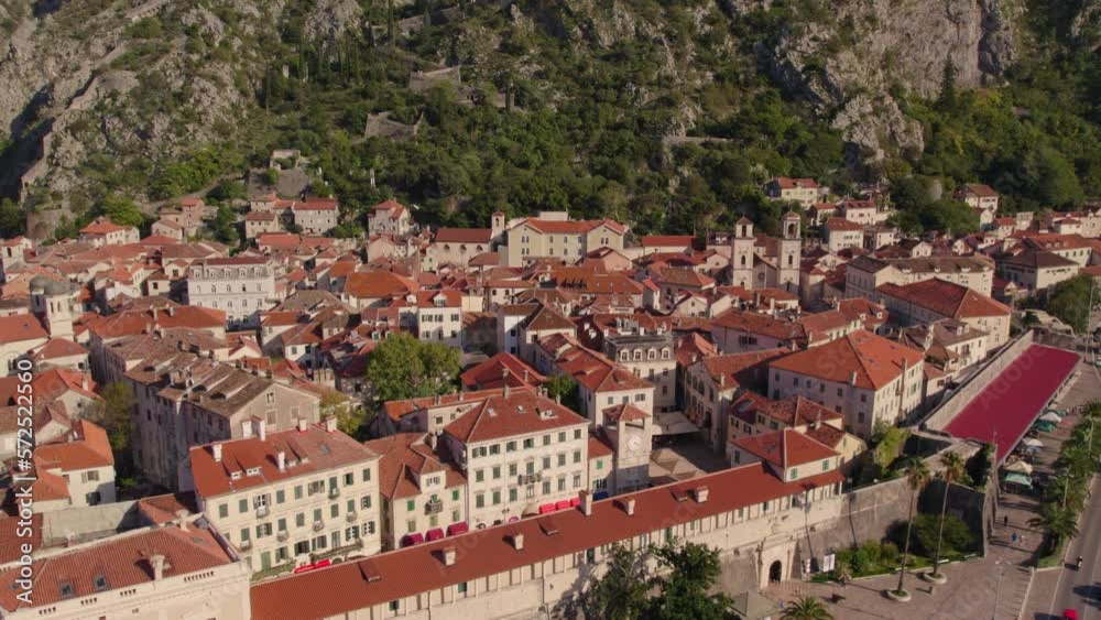 Medieval harbor town Kotor in Montenegro during sunset sunlight, aerial Medieval harbor town Kotor in Montenegro during sunset sunlight, aerial