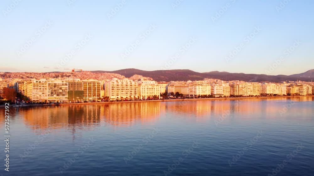 Thessoloniki Waterfront at Sunset, Aristotle Square, Upward Camera movement to reveal City Thessoloniki Waterfront at Sunset, Aristotle Square, Upward Camera movement to reveal City