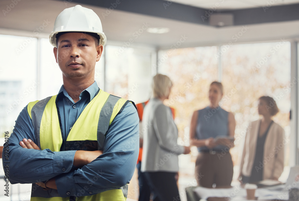 Portrait, construction worker and building with a man engineer standing arms folded in an architecture office. Industrial, mananger and leadership with a male architect working on a design project Portrait, construction worker and building with a man engineer standing arms folded in an architecture office. Industrial, mananger and leadership with a male architect working on a design project