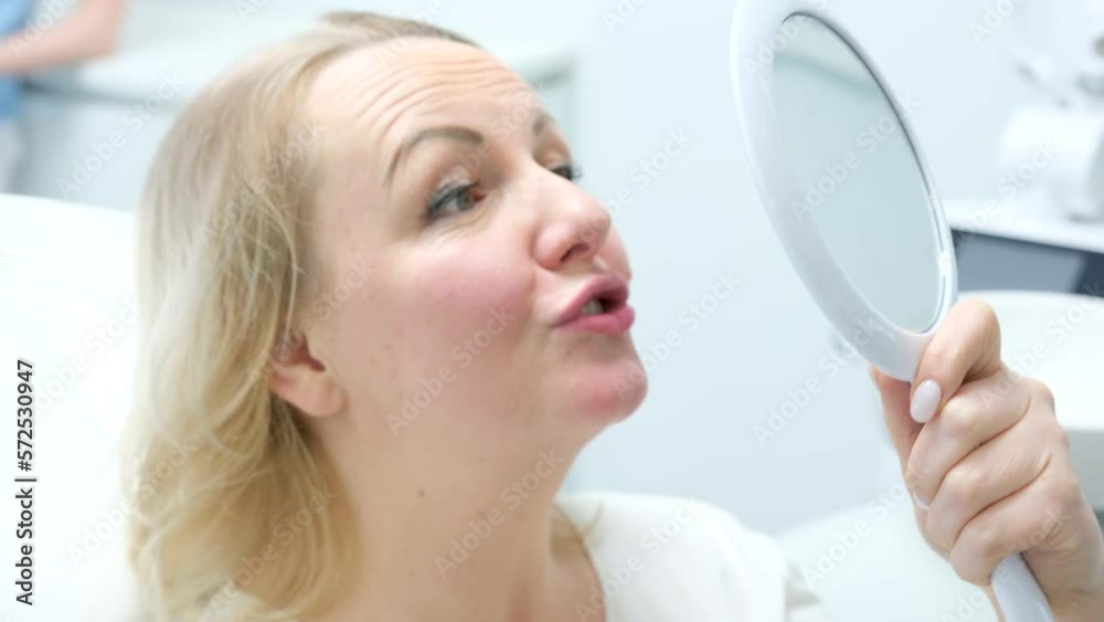 Be H3althy Woman looking in mirror and smiling after checkup at dentist office dentist and patient at dental clinic admiration joy woman talks about emotion shares impression laugh joyfully look Be H3althy Woman looking in mirror and smiling after checkup at dentist office dentist and patient at dental clinic admiration joy woman talks about emotion shares impression laugh joyfully look