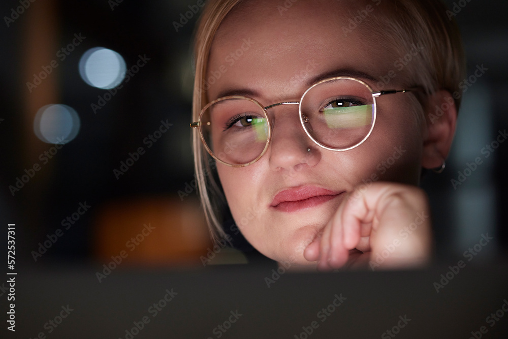 Night, office and woman with laptop reflection in her glasses while working overtime on a project. Technology, late and professional business female planning corporate report on computer in workplace Night, office and woman with laptop reflection in her glasses while working overtime on a project. Technology, late and professional business female planning corporate report on computer in workplace