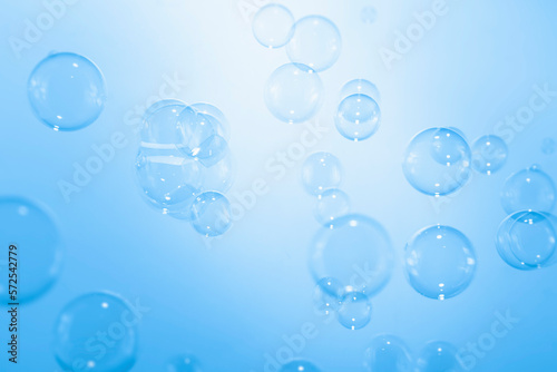Blue Soap Bubbles Abstract Background. Soap Sud Bubbles Water.