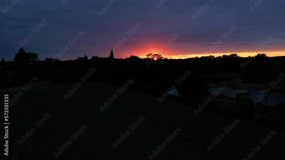 Colorful Warm Sunset Over Glamping Parc Buitengewoon In Ven-Zelderheide, Limburg, Netherlands. Aerial Wide Shot Colorful Warm Sunset Over Glamping Parc Buitengewoon In Ven-Zelderheide, Limburg, Netherlands. Aerial Wide Shot