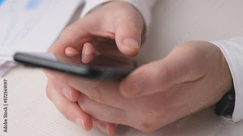 close hands typing a message on a smartphone 4k close hands typing a message on a smartphone 4k
