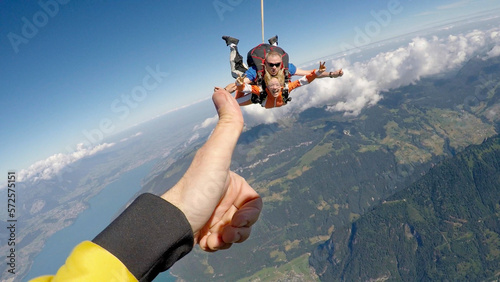 POV of tandem skydivers on descent photo