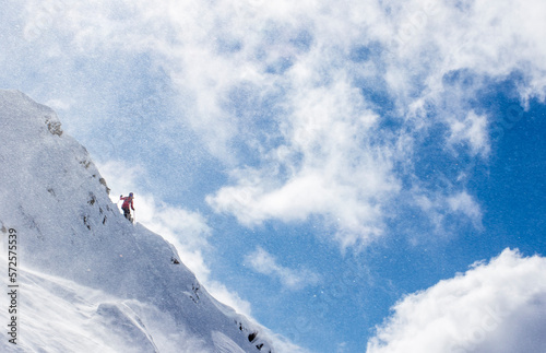 Professional Skier Michelle Parker Standing On A Ridge And Spots Her Line Before Dropping At Cerro Catedral In Argentina