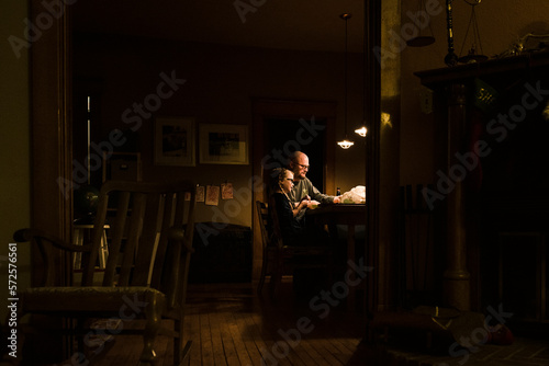 Wallpaper Mural Dad and daughter sit at dining room table Torontodigital.ca