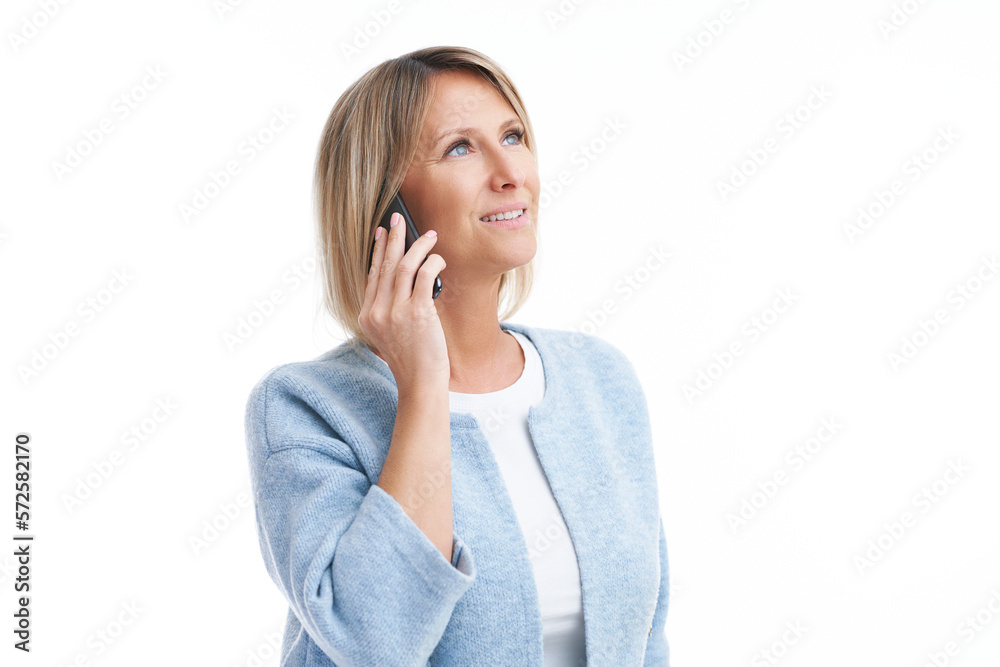 Picture of blonde woman over back isolated background with mobile phone Picture of blonde woman over back isolated background with mobile phone