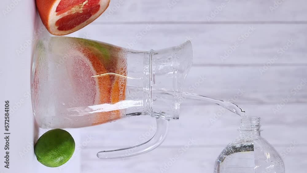 Grapefruit, lime and mineral water lemonade. Preparation of a non