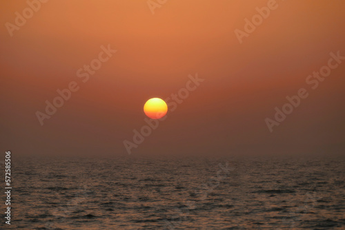 Fototapeta Naklejka Na Ścianę i Meble -  Sunrise Over Water Golden Hour