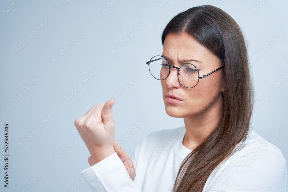 Isolated picture of brunette woman on white background wearing glasses Isolated picture of brunette woman on white background wearing glasses