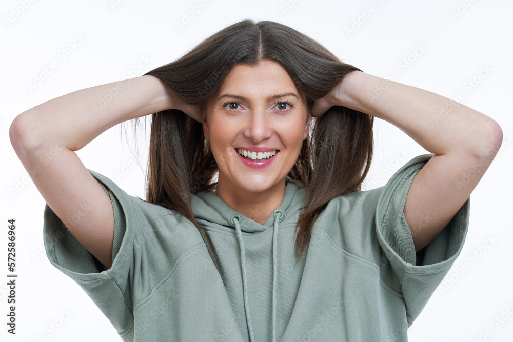 Isolated picture of brunette woman on white background in hoodie Isolated picture of brunette woman on white background in hoodie