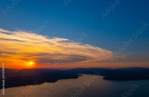 Aerial View over Lake Lucerne and Mountain in Sunset in Lucerne, Switzerland. © Mats Silvan