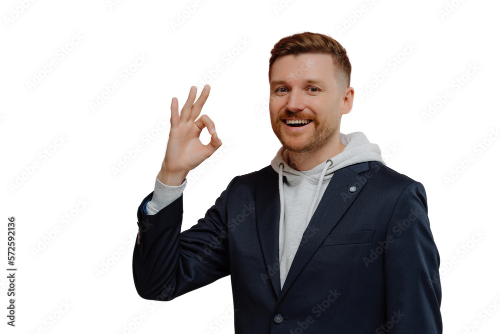 Happy redhead man showing okay gesture isolated over pink wall Happy redhead man showing okay gesture isolated over pink wall