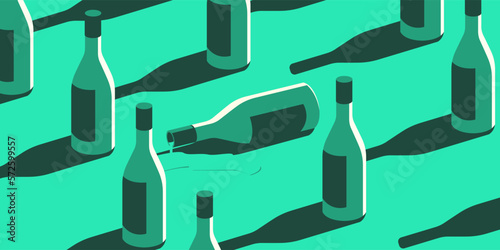 Many bottles of wine and one of them fell and spilled.