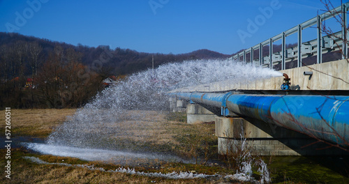 broken water pipe. damage to a water pipe.