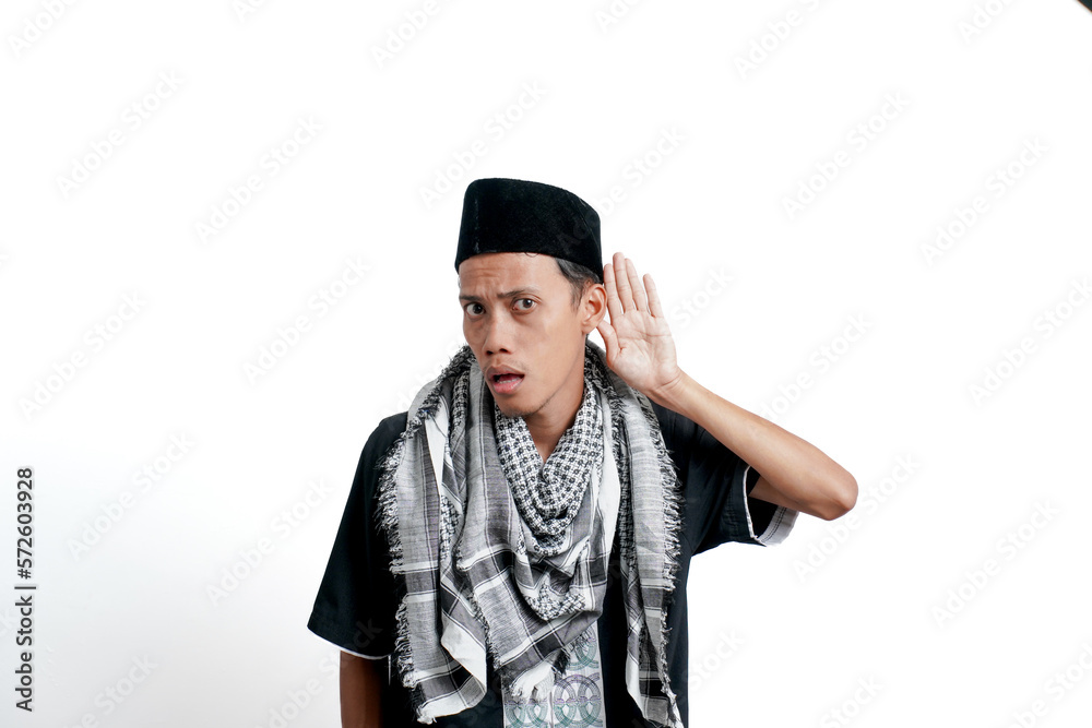 Religious muslim asian man wearing turban, muslim dress and cap. Trying to listen to gossip, hand to ear. isolated on white background. Religious muslim asian man wearing turban, muslim dress and cap. Trying to listen to gossip, hand to ear. isolated on white background.