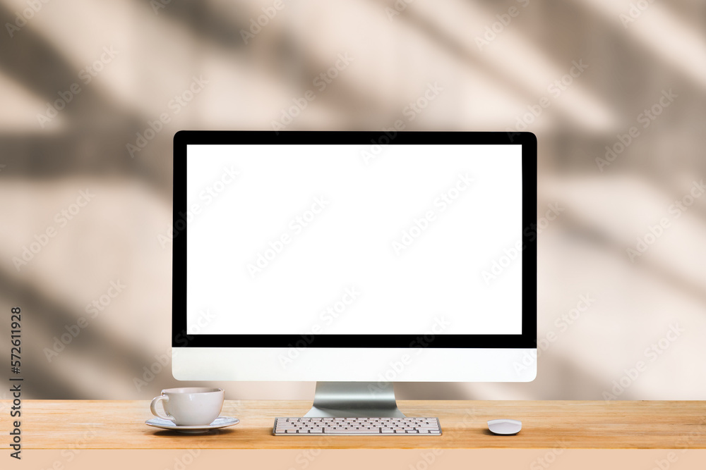 Workspace with simulated blank white screen computers and office equipment on a wooden table. Workspace with simulated blank white screen computers and office equipment on a wooden table.