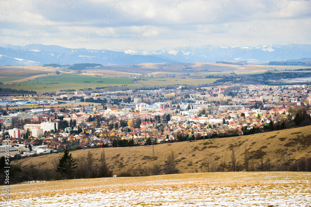 View from Haj-Nicovo to the part of Liptovsky Mikulas city in the spring and Low tatras. Slovakia, Liptov region.