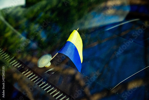 Ukrainian flag on a car windshield photo