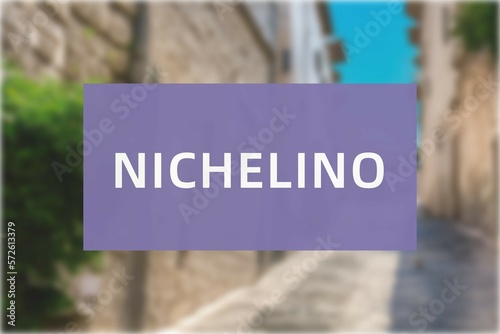 Nichelino: Der Name der italienischen Stadt Nichelino in der Region Piedmont vor einem Hintergrundbild photo