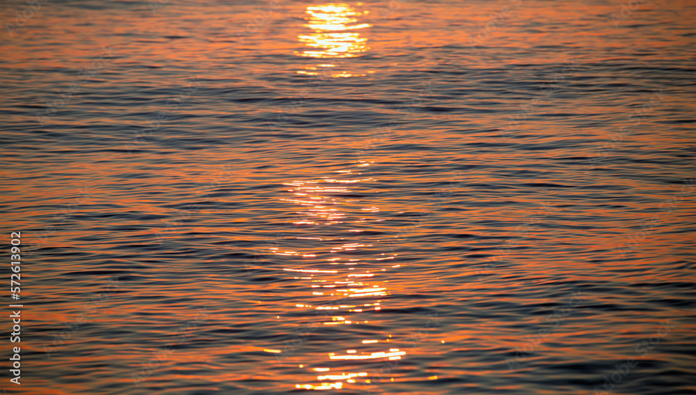 Beautiful colorful sunrise at the sea with dramatic clouds and sun shining Beautiful colorful sunrise at the sea with dramatic clouds and sun shining