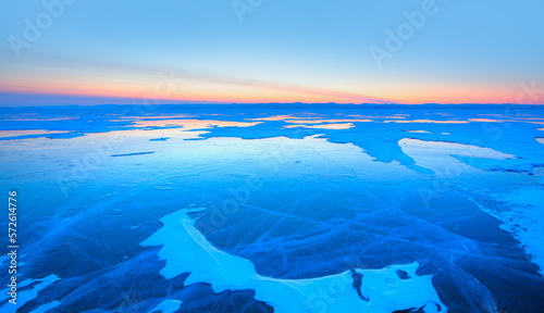 Frozen lake Baikal in winter season at amazing sunset, Olkhon island in Siberia, Russia