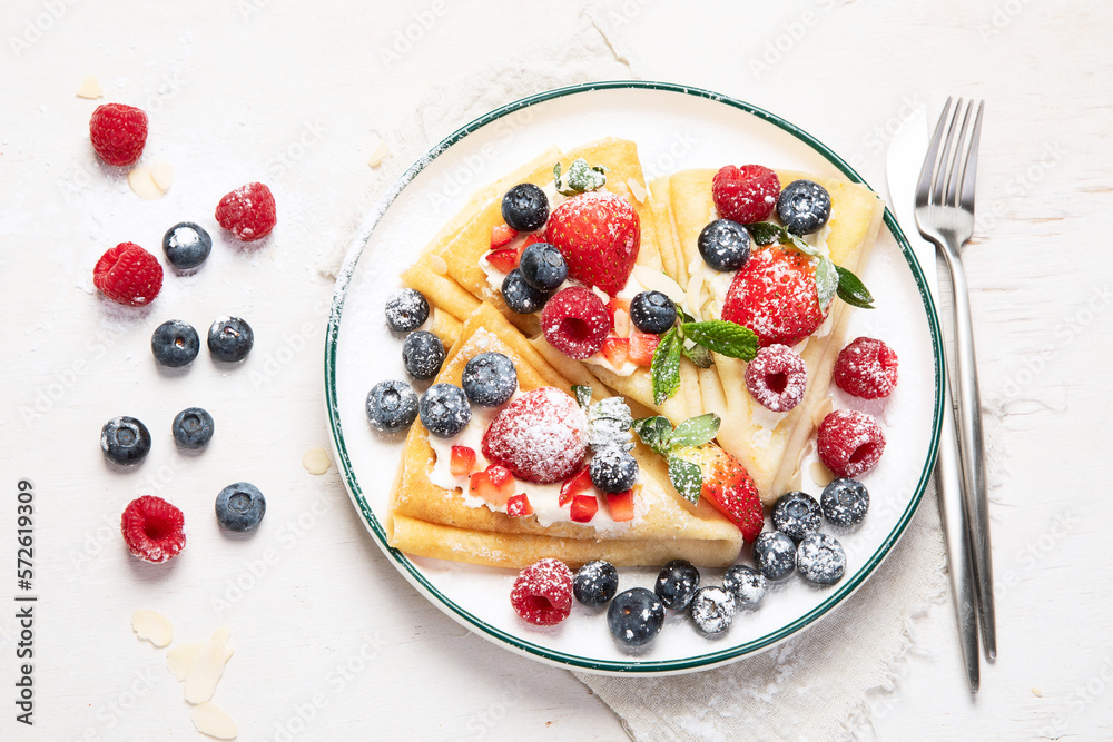 Healthy breakfast, homemade traditional crepes or pancakes Healthy breakfast, homemade traditional crepes or pancakes