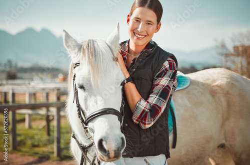 .Portrait, horse and woman with pet at ranch, bonding and animal care in the countryside outdoors. Pets, equestrian and horseback rider or smile of happy female with white stallion on farm outside.