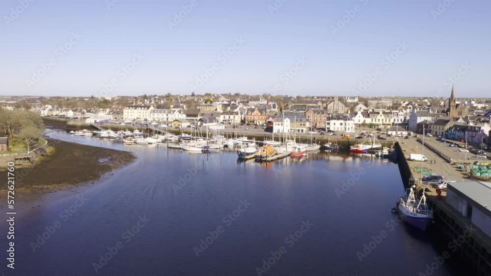 Drone shot of Stornoway Harbour on a sunny day on the Isle of Lewis, Outer Hebrides of Scotland, United Kingdom. Drone shot of Stornoway Harbour on a sunny day on the Isle of Lewis, Outer Hebrides of Scotland, United Kingdom.