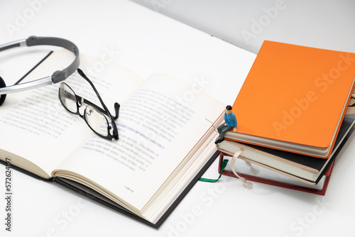 Open book and naked man's glasses