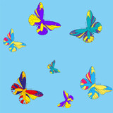 Multicolored butterflies on the background of the blue sky. Seamless vector pattern for textiles