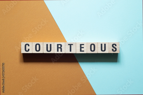 Courteous - word concept on cubes