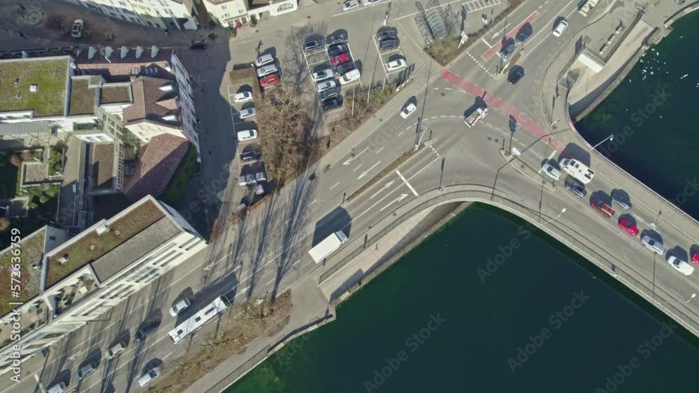 Top view of junction and bridge over Rhine River at City of Schaffhausen on a sunny winter day. Movie shot February 16th, 2023, Schaffhausen, Switzerland.