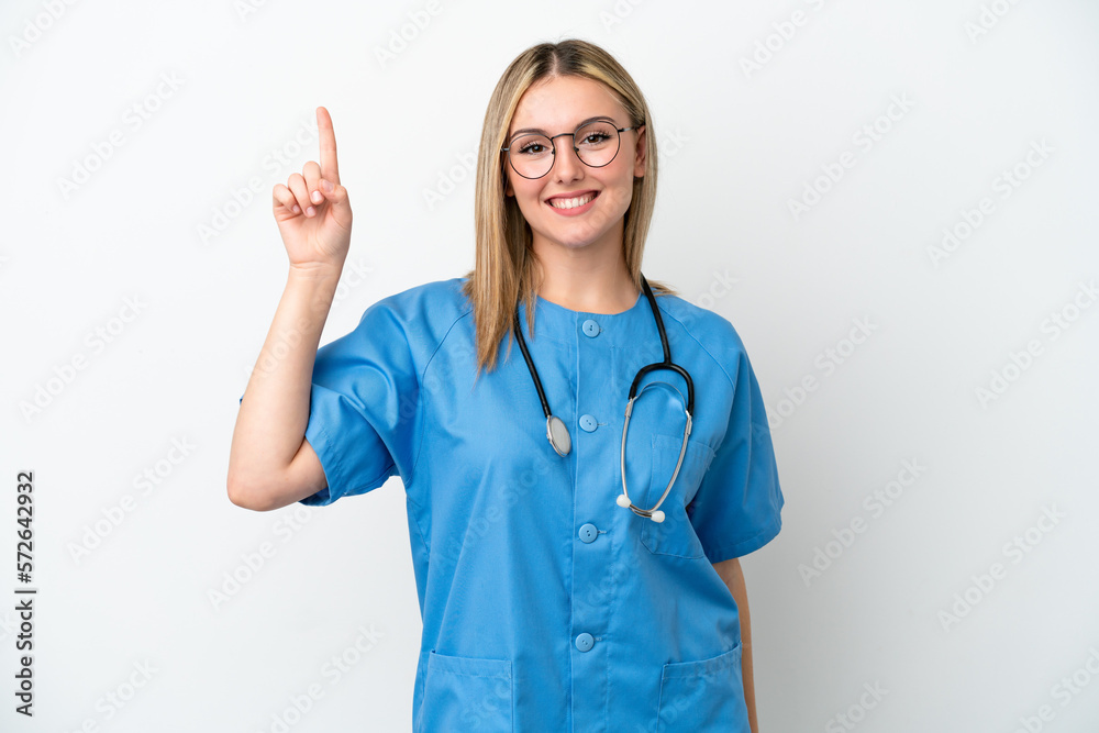 Young surgeon doctor woman isolated on white background pointing up a great idea Young surgeon doctor woman isolated on white background pointing up a great idea