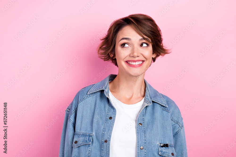 Fototapeta premium Portrait of young attractive girl model look interested empty space open bar restaurant wear trendy denim jacket isolated on pink color background