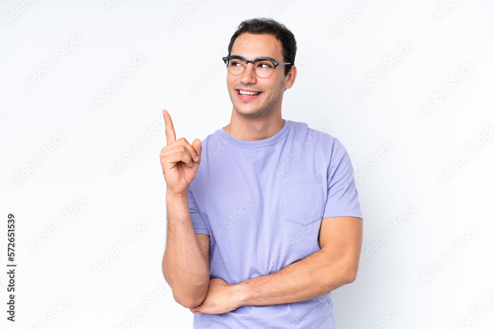 Young caucasian man isolated on white background pointing up a great idea Young caucasian man isolated on white background pointing up a great idea