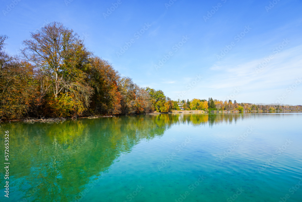 Idyllic autumn landscape by the lake.
